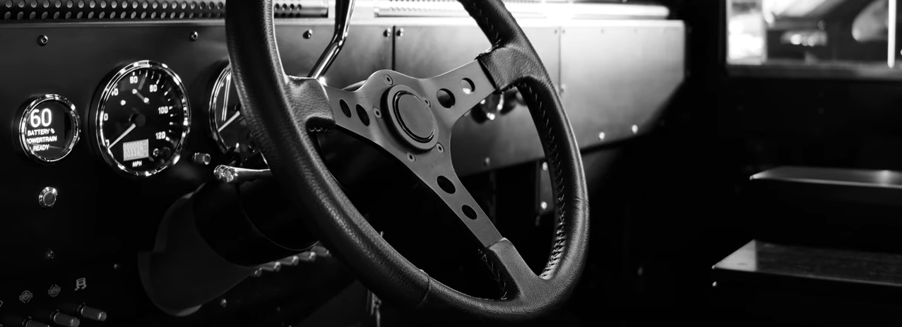 The B1 interior, focusing on the steering wheel and dashboard